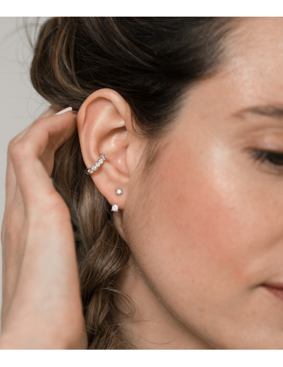 Ear piercing with diamonds